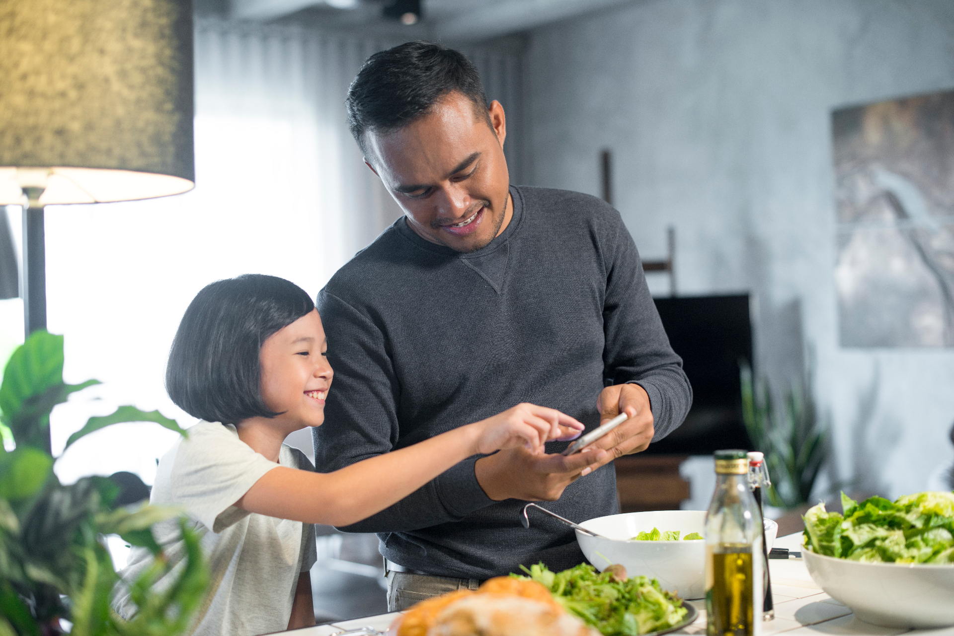 Family enjoying clean, filtered drinking water together